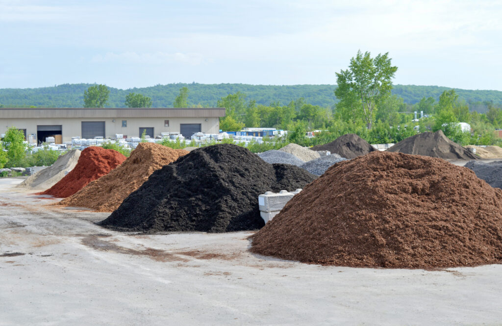 various,stone,and,cedar,mulch,piles,separated,into,various,types